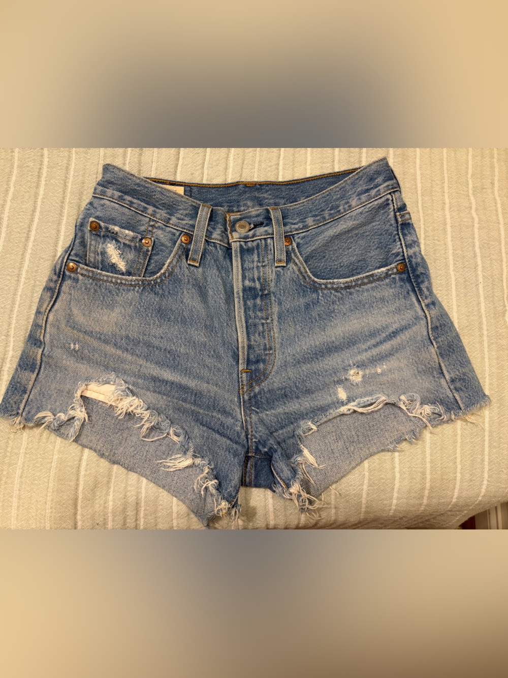 Levi's Light Blue Distressed High-Rise Jean Shorts